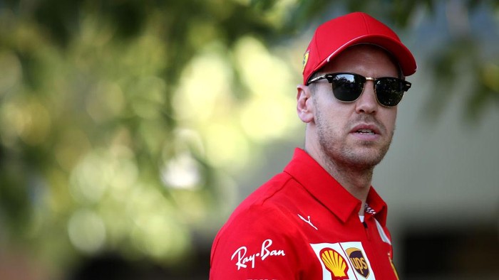 MELBOURNE, AUSTRALIA - MARCH 12: Sebastian Vettel of Germany and Ferrari looks on in the Paddock during previews ahead of the F1 Grand Prix of Australia at Melbourne Grand Prix Circuit on March 12, 2020 in Melbourne, Australia. (Photo by Mark Thompson/Getty Images)