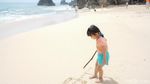Terpukau Indahnya Pantai Kubu di Balik Batu Karang Nusa Dua