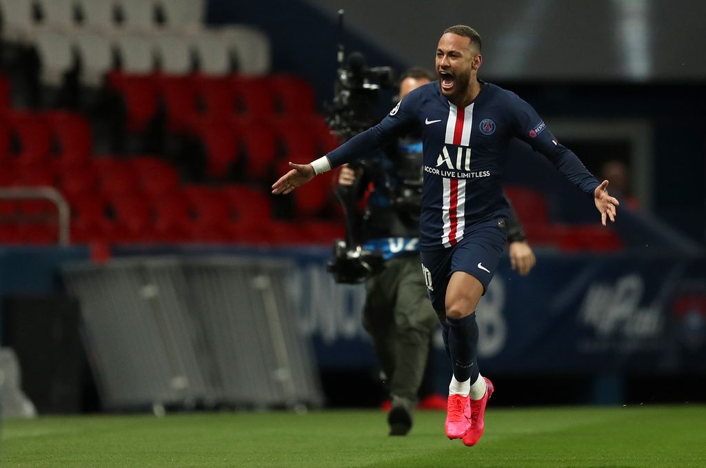 PARIS, FRANCE - MARCH 11: (FREE FOR EDITORIAL USE) In this handout image provided by UEFA, Neymar of Paris Saint-Germain celebrates after scoring his team's first goal during the UEFA Champions League round of 16 second leg match between Paris Saint-Germain and Borussia Dortmund at Parc des Princes on March 11, 2020 in Paris, France. The match is played behind closed doors as a precaution against the spread of COVID-19 (Coronavirus).  (Photo by UEFA - Handout/UEFA via Getty Images)
