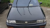 Foto: Toyota Corona warna hitam bernopol DE-276-CA parkir sejak 20 April 2019 pukul 06.33 WIB. Selama 9 bulan parkir, tarifnya mencapai Rp 76 juta. (dok.istimewa)