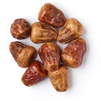 Heap of dates isolated on white background; top view