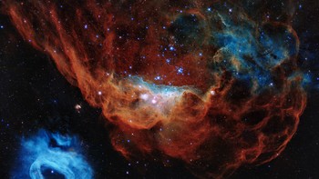 Cosmic Reef (NBC 2014 dan NGC 2020) berjarak 163.000 tahun cahaya dari Bumi. Foto ini dirilis NASA untuk merayakan ulang tahun Teleskop Hubble yang ke-30. Foto: NASA/ESA/STScI