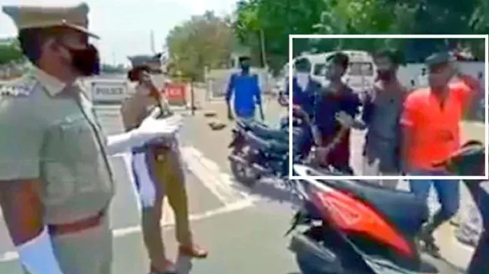 Pengendara motor di India tidak pakai masker