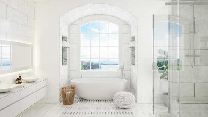 Interior of a contemporary bathroom with washstand and bathtube.