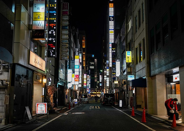 TOKYO, JAPAN - APRIL 07: A nightlife entertainment street usually busy with customers is seen empty in Tokyos Ginza district on April 07, 2020 in Tokyo, Japan. Japans Prime Minister Shinzo Abe declared a state of emergency on Tuesday to take effect from Wednesday for Tokyo and six additional prefectures, enabling prefectural governors to take stronger preventive measures against the spread of coronavirus, from instructing people to stay at home except for urgent matters to restricting the operation of schools and facilities. (Photo by Christopher Jue/Getty Images)