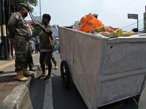 14 Wewenang Satpol PP DKI sebagai Penyidik di Draf Perda Corona