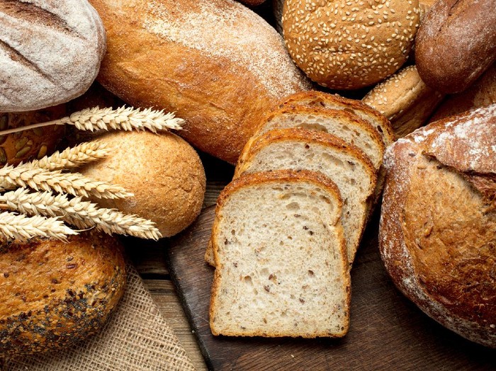 roti gandum heap of various bread on wooden background