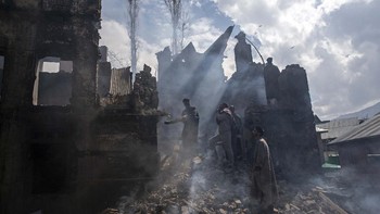 3 Fotografer Associated Press; Dar Yasin, Mukhtar Khan, dan Channi Anand, meraih penghargaan Pulitzer 2020 untuk fotografi fitur. AP Photo/Dar Yasin.