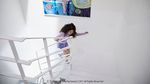 Pesona Ayu IU dalam Foto-foto BTS MV Eight