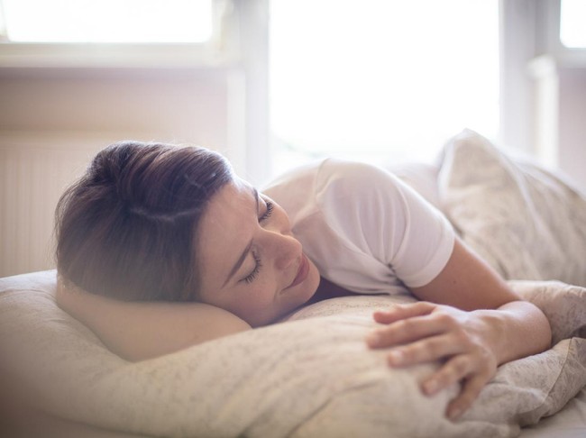 Theres nothing better than a lie in. Woman sleeping in bed.