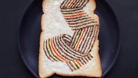 Roti panggang yang dibuat oleh Sasaki ini juga terlihat artistik. Ia membentuk deretan bahan makanan membentuk tali simpul yang rapih. Foto: Instagram @sasamana1204