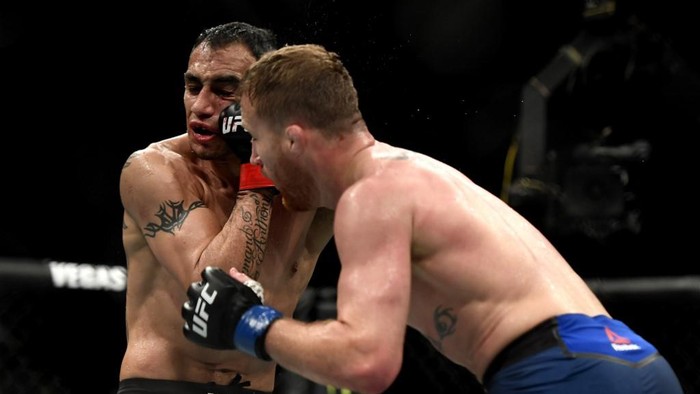 JACKSONVILLE, FLORIDA - MAY 09: Justin Gaethje (R) of the United States punches Tony Ferguson (L) of the United States in their Interim lightweight title fight during UFC 249 at VyStar Veterans Memorial Arena on May 09, 2020 in Jacksonville, Florida.   Douglas P. DeFelice/Getty Images/AFP