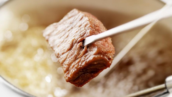 Raw Beef going into Fondue Pot-Photographed on Hasselblad H3D2-39mb Camera