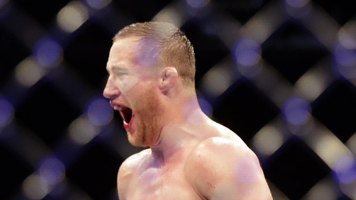 Justin Gaethje celebrates after winning his match against Tony Ferguson in a UFC 249 mixed martial arts bout, early Sunday, May 10, 2020, in Jacksonville, Fla. (AP Photo/John Raoux)