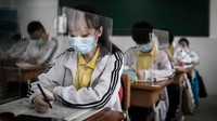 Sekolah kembali dibuka. (Foto: Getty Images/Stringer)