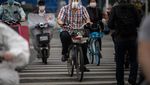 Riuhnya Warga Wuhan yang Gemar Bersepeda Listrik