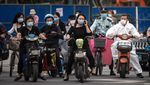Riuhnya Warga Wuhan yang Gemar Bersepeda Listrik