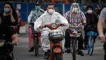 Riuhnya Warga Wuhan yang Gemar Bersepeda Listrik