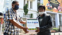 BTN turut peduli dan berbagi dalam membantu masyarakat terdampak COVID-19 dimana setidaknya sudah hampir mencapai Rp 4 Milyar BTN telah menyalurkan dalam bentuk sembako dan alat kesehatan di seluruh Indonesia. Foto: dok. Bank BTN