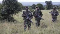 Potret polisi hutan melakukan patroli di kawasan konservasi Ol Pejeta di Kenya pada awal Mei lalu.