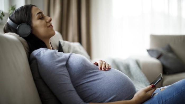 Woman enjoying pregnancy