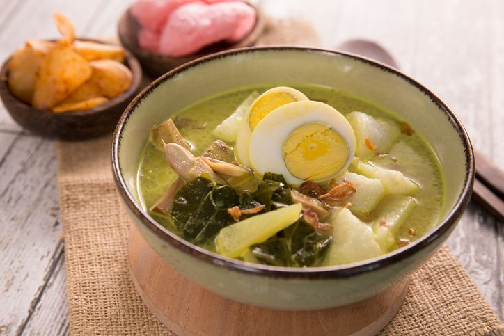 Lontong, a traditional dish in Malaysia and indonesia during Eid. The rice cooked and boiled inside the banana leaf wrap.