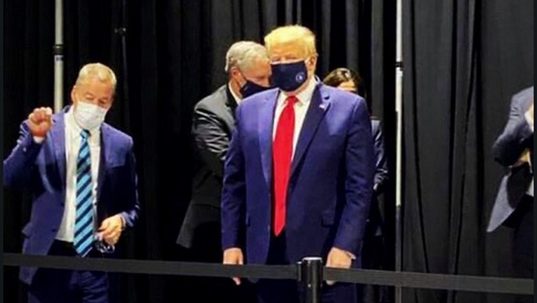 Donald Trump Donald Trump diam-diam memakai masker saat mengunjungi pabrik Ford