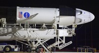 A SpaceX Falcon 9 rocket with the companys Crew Dragon spacecraft is rolled out of the horizontal integration facility at Launch Complex 39A as preparations continue for the Demo-2 mission, Thursday, May 21, 2020, at NASAs Kennedy Space Center in Cape Canaveral, Fla. (Bill Ingalls/NASA via AP)