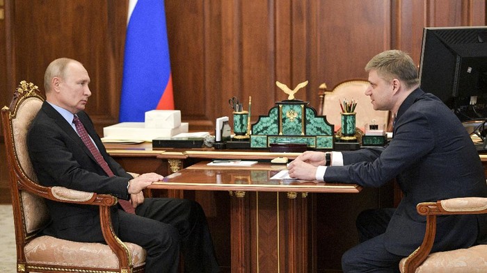 Russian President Vladimir Putin, left, listens to Russian Railways CEO Oleg Belozyorov during their meeting in the Kremlin, Russia, Monday, May 25, 2020. (Alexei Druzhinin, Sputnik, Kremlin Pool Photo via AP)