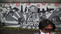 Mural ini mengajak warga untuk penerapkan hidup sehat untuk melawan Corona.