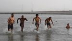 Potret India di Tengah Pandemi, Gelombang Panas-Serbuan Belalang