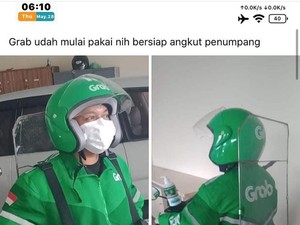 Penampakan Sekat Abang Ojol dan Penumpang Hadapi New Normal