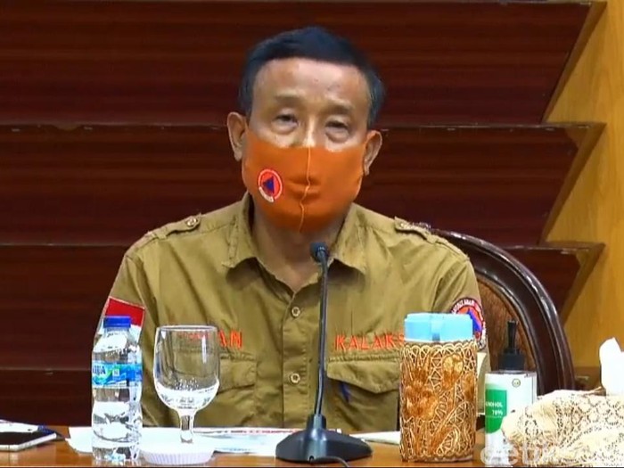 Wali Kota Surabaya Tri Rismaharini marah-marah karena mobil PCR bantuan dari BNPB dibawa ke kota lain. Kini Kalaksa BPBD Jatim, Suban Wahyudiono menjelaskan soal status mobil tes swab tersebut.