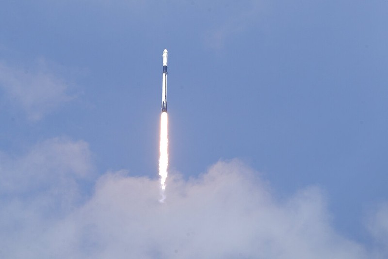 A SpaceX Falcon 9, with NASA astronauts Doug Hurley and Bob Behnken in the Crew Dragon capsule, lifts off from Pad 39-A at the Kennedy Space Center in Cape Canaveral, Fla., Saturday, May 30, 2020. The two astronauts are on the SpaceX test flight to the International Space Station. For the first time in nearly a decade, astronauts blasted towards orbit aboard an American rocket from American soil, a first for a private company. (AP Photo/David J. Phillip)