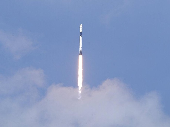 A SpaceX Falcon 9, with NASA astronauts Doug Hurley and Bob Behnken in the Crew Dragon capsule, lifts off from Pad 39-A at the Kennedy Space Center in Cape Canaveral, Fla., Saturday, May 30, 2020. The two astronauts are on the SpaceX test flight to the International Space Station. For the first time in nearly a decade, astronauts blasted towards orbit aboard an American rocket from American soil, a first for a private company. (AP Photo/David J. Phillip)