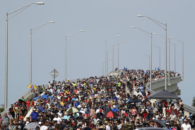 A SpaceX Falcon 9, with NASA astronauts Doug Hurley and Bob Behnken in the Crew Dragon capsule, lifts off from Pad 39-A at the Kennedy Space Center in Cape Canaveral, Fla., Saturday, May 30, 2020. The two astronauts are on the SpaceX test flight to the International Space Station. For the first time in nearly a decade, astronauts blasted towards orbit aboard an American rocket from American soil, a first for a private company. (AP Photo/David J. Phillip)