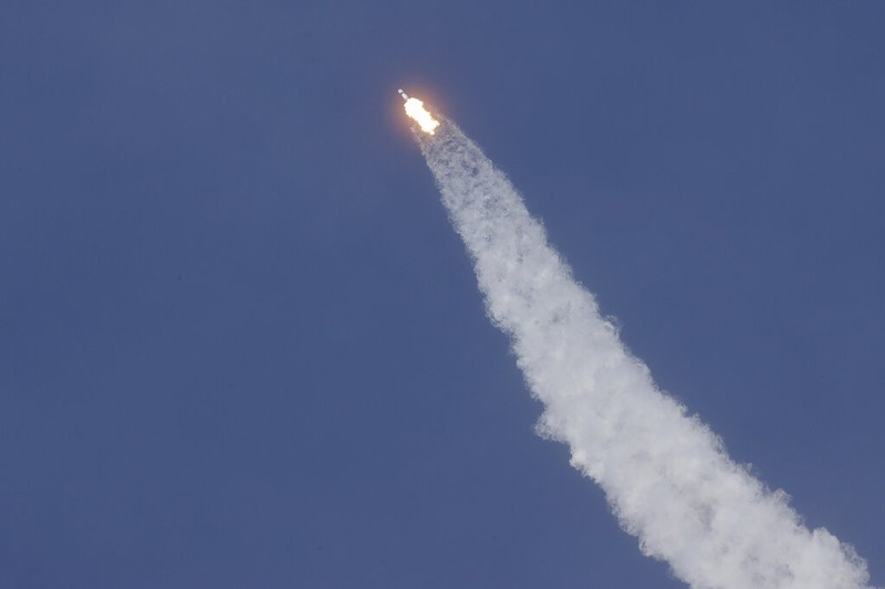 A SpaceX Falcon 9, with NASA astronauts Doug Hurley and Bob Behnken in the Crew Dragon capsule, lifts off from Pad 39-A at the Kennedy Space Center in Cape Canaveral, Fla., Saturday, May 30, 2020. The two astronauts are on the SpaceX test flight to the International Space Station. For the first time in nearly a decade, astronauts blasted towards orbit aboard an American rocket from American soil, a first for a private company. (AP Photo/David J. Phillip)