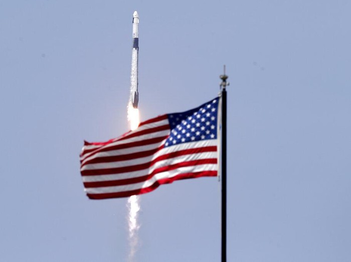 A SpaceX Falcon 9, with NASA astronauts Doug Hurley and Bob Behnken in the Crew Dragon capsule, lifts off from Pad 39-A at the Kennedy Space Center in Cape Canaveral, Fla., Saturday, May 30, 2020. The two astronauts are on the SpaceX test flight to the International Space Station. For the first time in nearly a decade, astronauts blasted towards orbit aboard an American rocket from American soil, a first for a private company. (AP Photo/David J. Phillip)