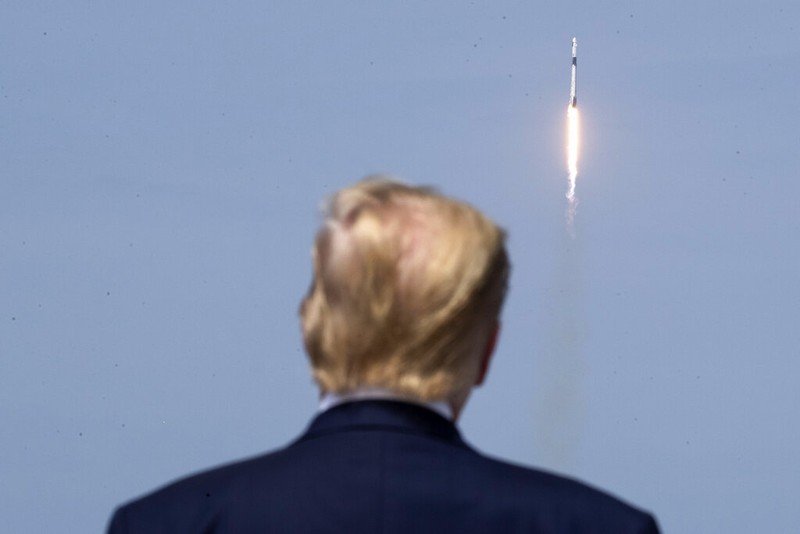 A SpaceX Falcon 9, with NASA astronauts Doug Hurley and Bob Behnken in the Crew Dragon capsule, lifts off from Pad 39-A at the Kennedy Space Center in Cape Canaveral, Fla., Saturday, May 30, 2020. The two astronauts are on the SpaceX test flight to the International Space Station. For the first time in nearly a decade, astronauts blasted towards orbit aboard an American rocket from American soil, a first for a private company. (AP Photo/David J. Phillip)