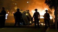 Polisi dikerahkan untuk meredam demo yang berujung rusuh di Washington. AP Photo/Alex Brandon.