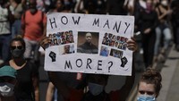 Aksi solidaritas ini digelar saat Inggris masih dalam masa lockdown untuk membatasi penyebaran virus Corona (COVID-19). AP Photo/Matt Dunham.