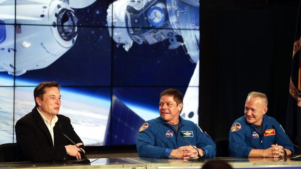 Vice President Mike Pence, his wife Karen, right, NASA administrator, Jim Bridenstine, center and CEO of SpaceX, Elon Musk, talk to the media after NASA astronauts Douglas Hurley and Robert Behnken left the Neil A. Armstrong Operations and Checkout Building on their way to Pad 39-A, at the Kennedy Space Center in Cape Canaveral, Fla., Wednesday, May 27, 2020. The two astronauts will fly on a SpaceX test flight to the International Space Station. For the first time in nearly a decade, astronauts will blast into orbit aboard an American rocket from American soil, a first for a private company. (AP Photo/John Raoux)