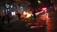 Gelombang protes yang berujung kerusuhan terus terjadi sejak kematian Fyord pada Senin (25/52020) lalu. AP Photo/Wong Maye-E.