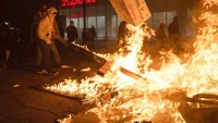 Aksi yang berujung rusuh ini buntut dari kematian George Floyd pada Senin (25/5/2020) lalu. AP Photo/Ethan Swope.