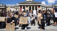 Gelombang protes atas kematian George Floyd tak hanya terjadi di Amerika Serikat tetapi merambah hingga ke sejumlah negara di dunia, salah satunya Inggris. Dominic Lipinski/PA via AP.