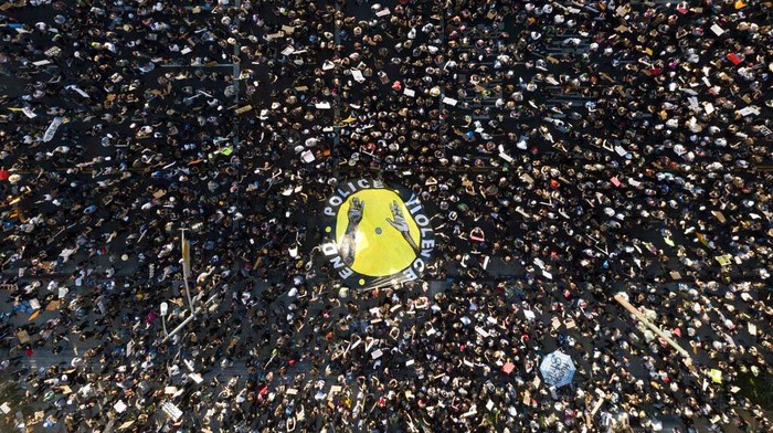 Demonstrators take part in a protest, Wednesday, June 3, 2020, in downtown Los Angeles, sparked by the death of George Floyd, who died May 25 after he was restrained by Minneapolis police. (AP Photo/Ringo H.W. Chiu)