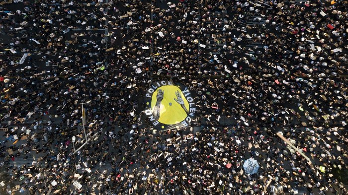 Demonstrators take part in a protest, Wednesday, June 3, 2020, in downtown Los Angeles, sparked by the death of George Floyd, who died May 25 after he was restrained by Minneapolis police. (AP Photo/Ringo H.W. Chiu)