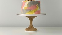 Desain kedua kue yang ditawarkan oleh Butter& terbilang artistik. Dengan tambahan ornamen kepingan emas cukup besar sebagai toppingnya. Paduan warna abu-abu, merah muda, dan kuning membuat kue tersebut jadi terlihat menarik. Foto: Instagram @butter_and