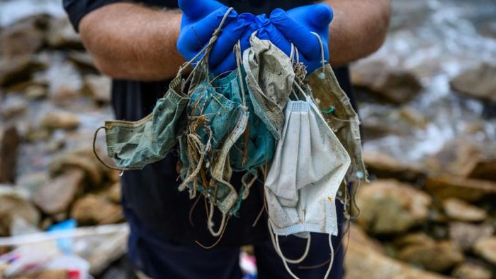 Limbah masker wajah di Hong Kong (AFP Photo) Limbah masker wajah di Hong Kong (AFP Photo)