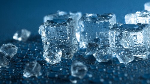 Ice cubes with water drops